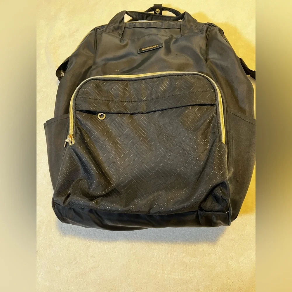 Black Quilted Travel Backpack with Gold Trim